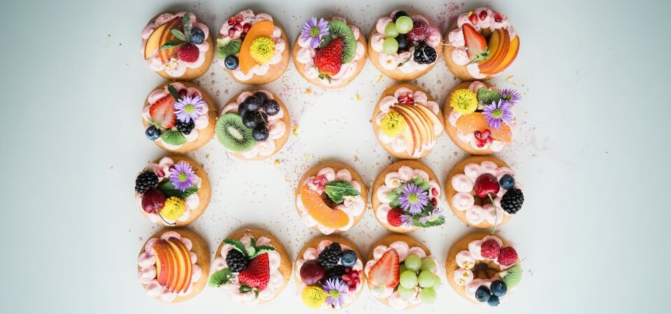 Beautifully decorated pastry and sushi platter on a superyacht